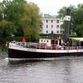 100 year old steam engine boat on Potsdam's Havel lakes.